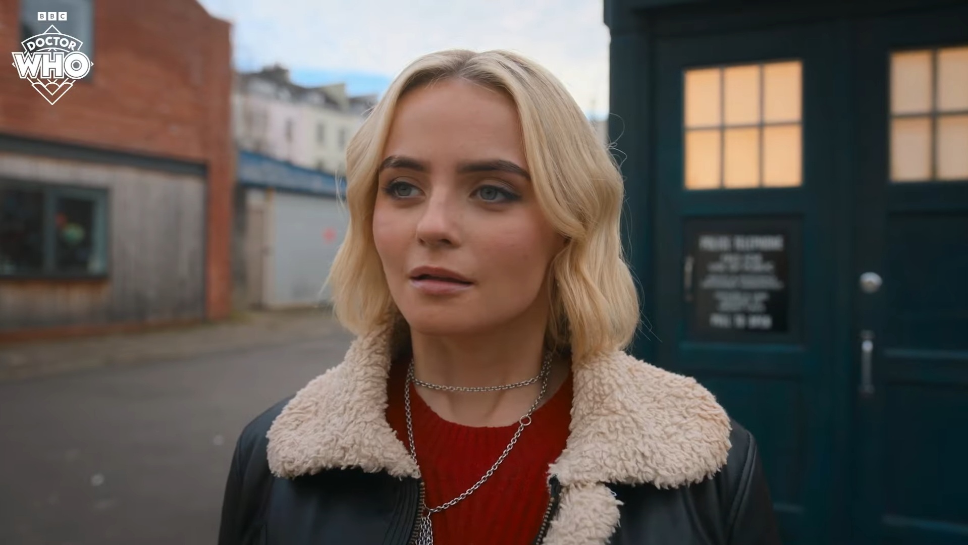 Ruby stands next to the Fifteenth Doctor's TARDIS.
