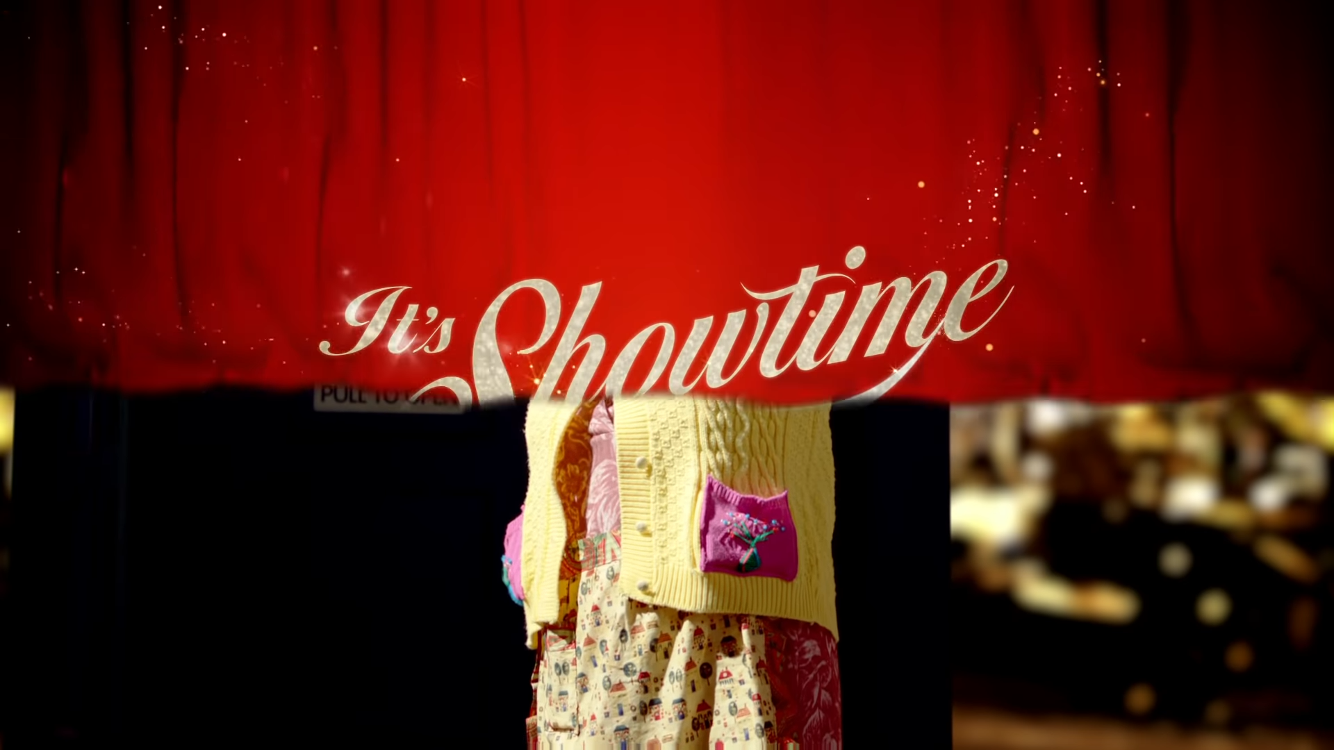 The It's Showtime [+]Loading...["It's Showtime (TV story)"] banner falls in front of Agnes.