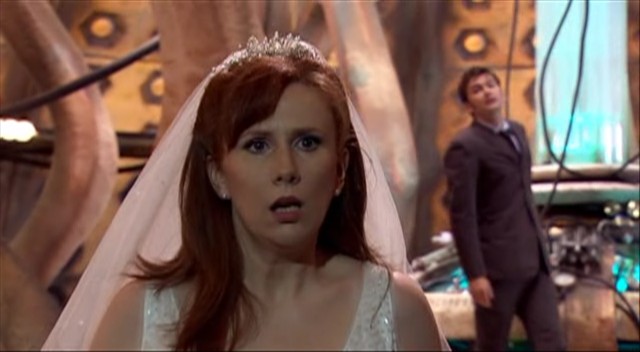 Donna looks out of the doors. (TV: The Runaway Bride [+]Loading...["The Runaway Bride (TV story)"])