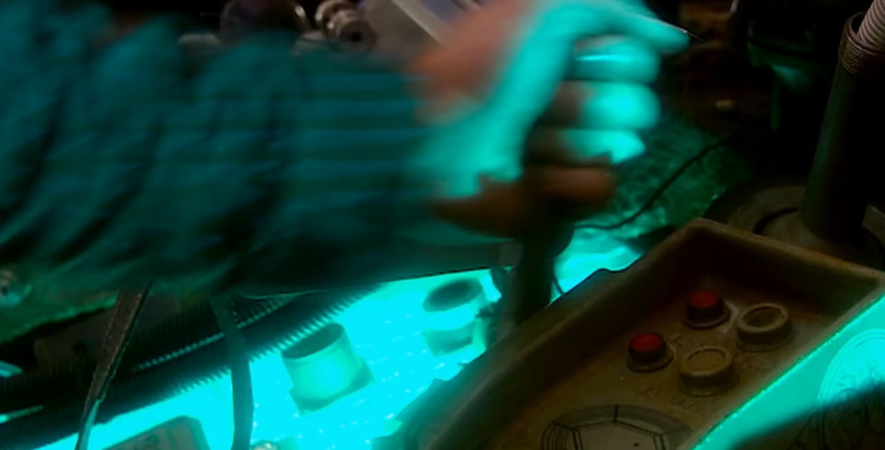 The Doctor grabs a lever on the TARDIS console. (TV: Untitled [+]Loading...["Untitled (Disney XD TV story)"])