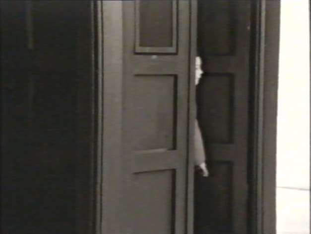 A young boy exits the TARDIS into the Blue Peter studio. (TV: Future Generations [+]Loading...["Future Generations (TV story)"])