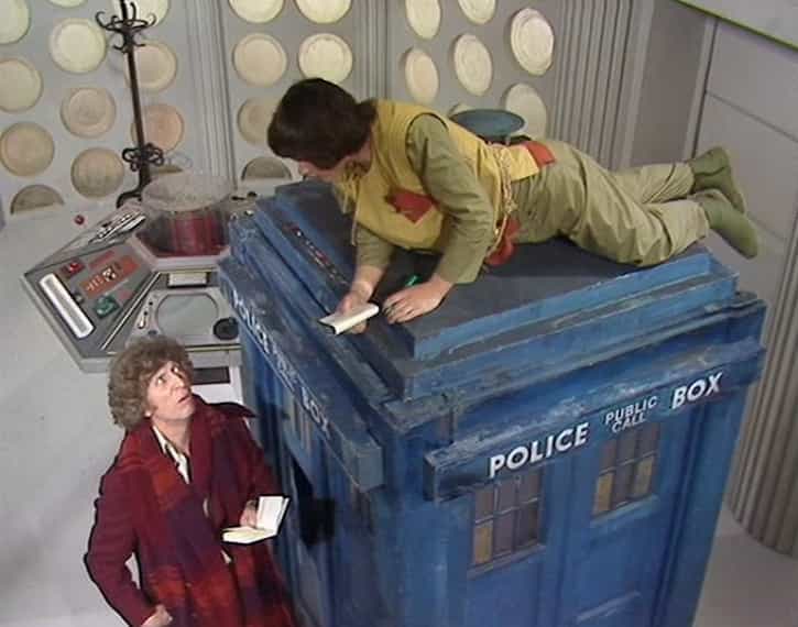 The Doctor and Adric measuring the police box. (TV: Logopolis [+]Loading...["Logopolis (TV story)"])