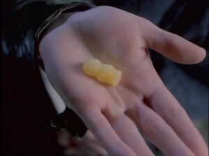 Eighth Doctor offers jelly baby.jpg