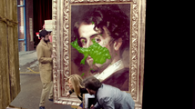 The snot lands on the portrait.