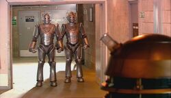 An amusing encounter between a Cult Dalek and a pair of Cybermen