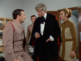 The Doctor and Liz try to convince the Brigadier to act quickly.