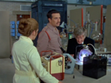 Liz and Dr Who listen as Lethbridge-Stewart complains about the narrow-mindedness of General Scobie, unaware that he has been replaced by an Auton duplicate.