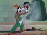 Goofy dusts the bell.