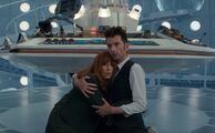 The Doctor hugs Donna.