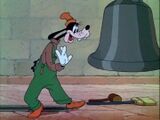 Goofy tests the bell, with it letting out a ring.