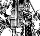 Davros is baffled to realise his rescuers are the Sixth Doctor and Peri Brown.