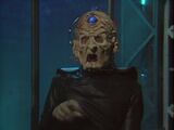 Davros sputters and whimpers wildly upon hearing that the Daleks lost the Dalek-Movellan War.