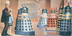 A still from Dr. Who and the Daleks, featuring Peter Cushing and Roberta Tovey as Dr. Who and Susan with the Daleks in the Dalek City.