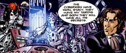 Cybermen study the console. (COMIC: Dreadnought [+]Loading...["Dreadnought (comic story)"])