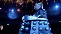 Davros watches as the power of the Bad Wolf entity overtakes the concert hall.