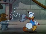 Donald carries his mop.