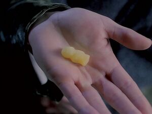 Eighth Doctor offers jelly baby.jpg