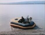 Doctor drives hovercraft off beach.jpg