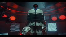 The Dalek's platform ceases movement.