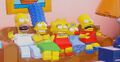 The Simpsons on their couch.jpg