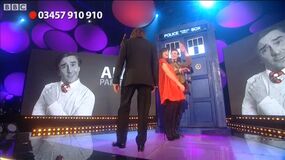 Ross watches 11 take Winkleman into the TARDIS 2.jpg