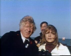 Doctor and Jo on boat approach prison.jpg