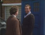 The Doctor and the Master clash beside the TARDIS. (TV: Survival [+]Loading...["Survival (TV story)"])