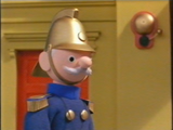 Captain Flack just outside Trumpton Fire Station.