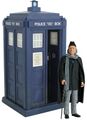 First Doctor in hat & cloak with walking stick and skull and TARDIS from An Unearthly Child