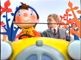 Noddy drives ahead with the boy.