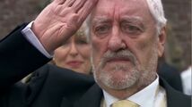 Wilfred Mott saluting the Doctor at his granddaughter's wedding.