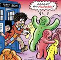 The Doctor and Sarah walk out, the Doctor eating a jelly baby, as they find the planet populated by jelly baby-like people.