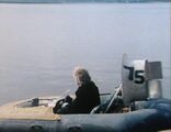 Doctor at controls of hovercraft-back.jpg