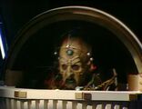 Davros closes his casing again, making to escape.