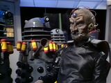 Davros gives final instructions to the Dalek suicide-bombers he has outfitted.