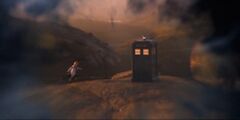 The Doctor runs towards the TARDIS on Desolation. (TV: The Ghost Monument [+]Loading...["The Ghost Monument (TV story)"])