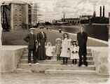 Photograph of the Ninth Doctor with the Daniels family.