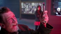 War Doctor Using Sonic on Memory Equipment.jpg